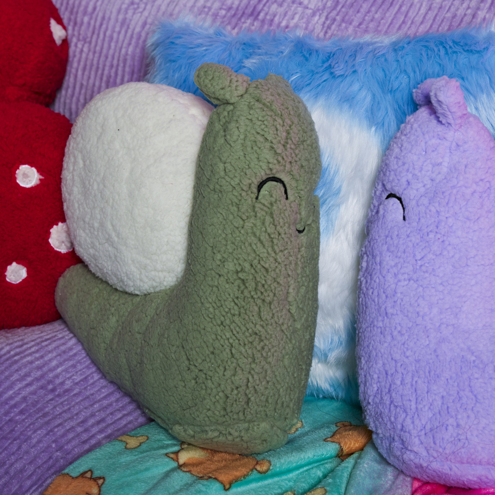 sherpa snail shaped pillow 14in